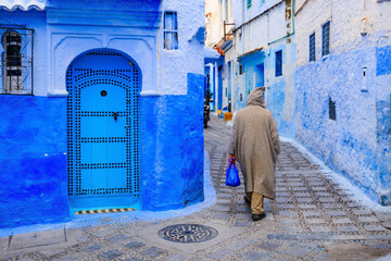 Chefchaouen, Morocco. The old walled city, or medina with its traditional houses painted in blue...