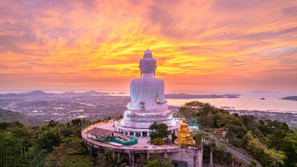 Sunrise at the Big Buddha located on the top of a mountain is a scenic spot in Phuket Province, Thailand, Asia.
