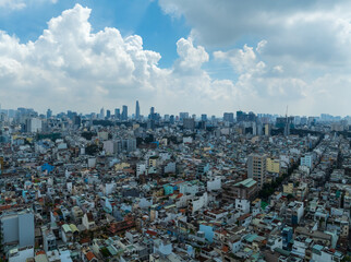 Aerial view of crowded residential houses in Ho Chi Minh city, Vietnam. - obrazy, fototapety, plakaty