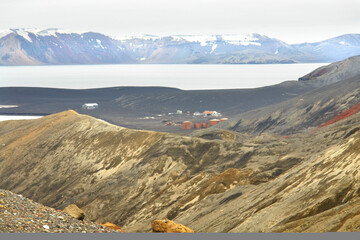 Deception Island close to the Antarctic Peninsula with  underlying active volcano.