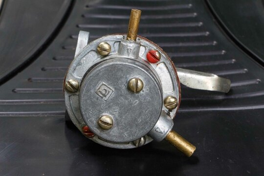 Fuel pump from an old carburetor gasoline engine of a USSR car. Moskvich