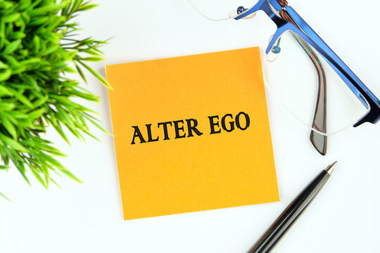 Text Alter ego is translated from Latin as the second self. a real or invented alternative personality of a person. Written on an orange sticker on a white background