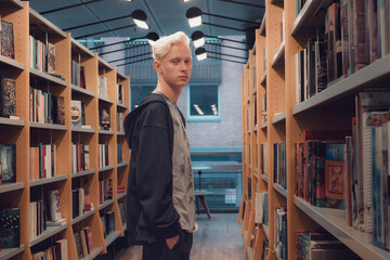A young man came to the library to find books for studying at the university