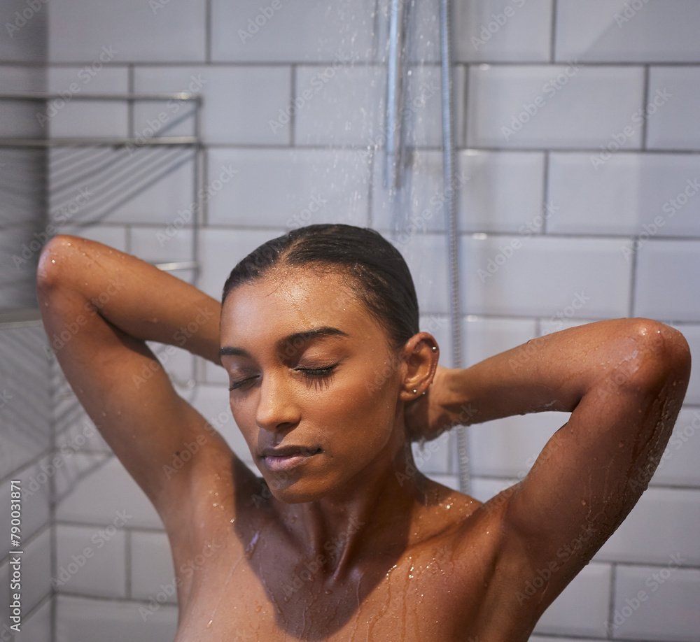 Wall mural Woman, shower and bathroom in home with water drops, splash and hygiene with routine, hair and skincare. Girl, Indian person and cleaning body to stop bacteria in morning at apartment in Mumbai