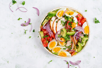 Healthy cobb salad with chicken, avocado, tomato, red onions and eggs. American food. Top view, overhead - 790033403