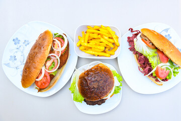 Big tasty burger with beef cutlet on a plate. Crispy chicken burger.