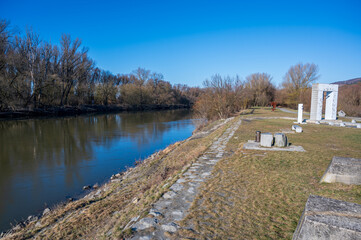 Fototapeta na wymiar Embankment of the Morava River with monument. Bratislava.