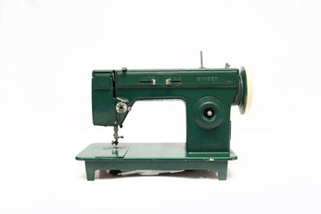 Vintage sewing machine on white background for needlework. Old Zig Zac plan MC sewing Machine