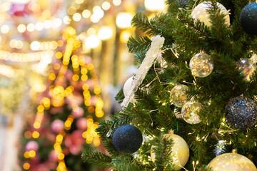 Holiday season, Christmas tree with bokeh lights, festive garland, winter magic