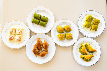 Turkish Dessert Sobiyet  Baklava, mussels baklava and classic baklava with Pistachio . Cevizli, Fistikli Baklava, top view.