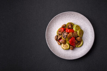 Delicious fresh grilled vegetables zucchini, bell peppers, mushrooms and onions