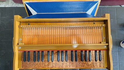 Beautiful Yellow Indian Harmonium. Traditional Indian musical organ instrument Yellow Color...