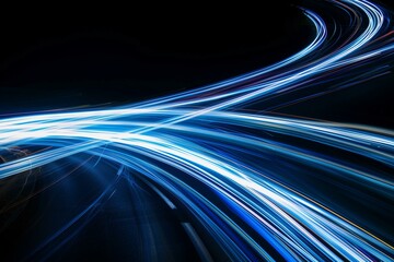 Dynamic blue and white light trajectories on a dark backdrop with long exposure