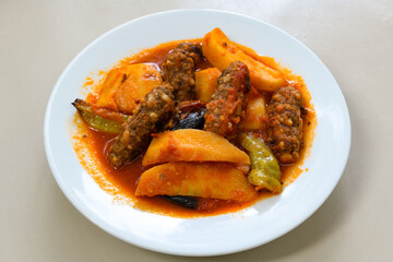 Eksili Kofte. Very nice izmir patties, potatoes, tomatoes and Turkish spices. Misket Izmir Kofte. Sulu Kofte. Fellah, ekmek arasi izgara kofte. Manisa, Akcaabat, Akhisar kofte. Delicious meat grilled 