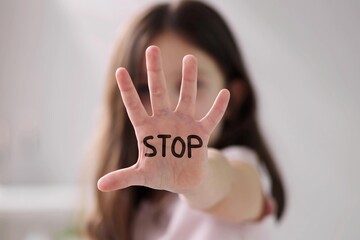 Stop Child Abuse: Hand Showing Girl Says