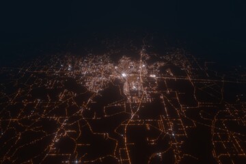 Aerial view on Monroe (USA) from south. Satellite view on modern city at night