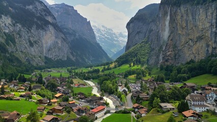 Aerial view of Lauterbrunnen valley in Switzerland. Gorgeous mountains with glaciers, waterfalls and valley - nature of Swiss Alps. Swiss alpine village Lauterbrunnen 