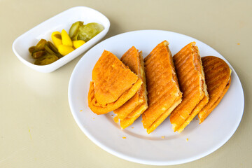 Turkish karisik atom  tost ( kasarli bazlama tost) . Sucuklu, Kasarli, kavurmali karisik tost. Flat...