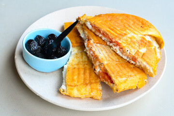 Turkish karisik atom  tost ( kasarli bazlama tost) . Sucuklu, Kasarli, kavurmali karisik tost. Flat...