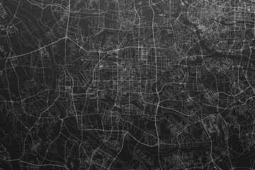 Street map of Foshan (China) on black paper with light coming from top