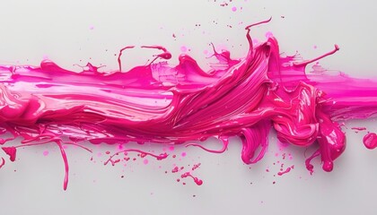 A closeup shot of a pink art paint splash on a white surface