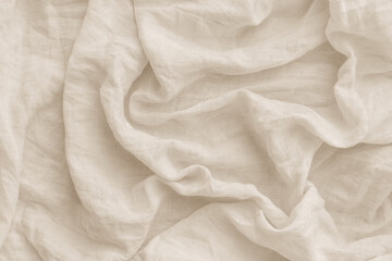 Beige linen background with natural look with wrinkles and drapes