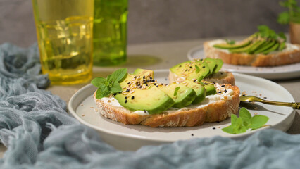 Toast with avocado cream cheese and wheat bread