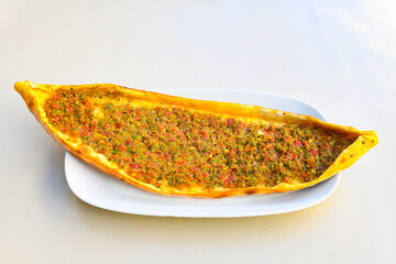 Kiymali pide. Turkish pide with minced meat. Turkish pizza mince pita Pide on white background. Etli ekmek. Kusbasi kasarli, kiymali kasarli, kiymali yumurtali, Bafra, Trabzon, Kusbasili pide.