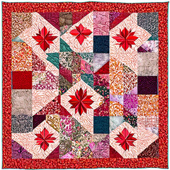 A traditional quilt with an intricate patchwork of designs Transparent Background Images 