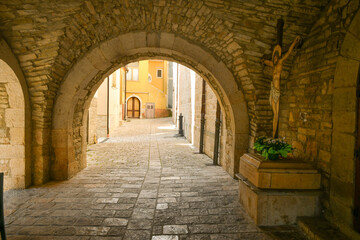 Fototapeta na wymiar A street in Roseto Valfortore, a medieval village in the province of Foggia in Italy.