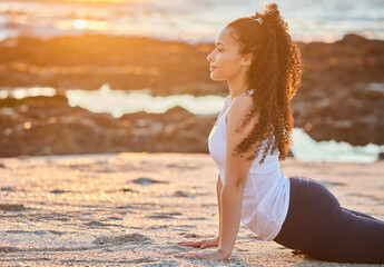 Beach, sunset and woman with stretching in yoga for muscle relief, balance or mindfulness. Healthy...