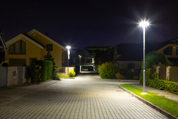 modern led illumination on quiet street at night - 790111245