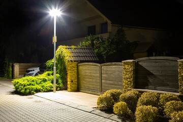 safety night street in residential area, modern street lights - 790111246