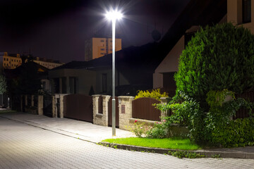 modern led illumination on quiet street at night - 790111250