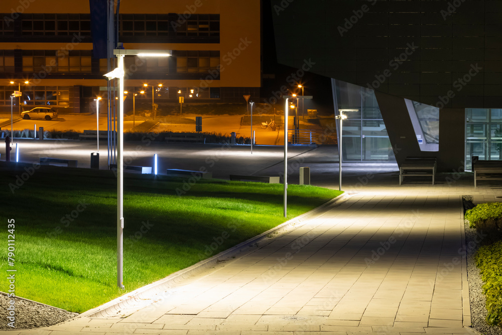 Wall mural modern university campus with modern illumination at night