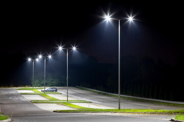 empty parking area with safety modern illumination at night - 790112867