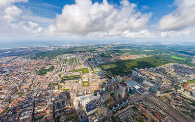 Naklejka premium The Hague, Netherlands. Panorama of the summer city in clouds weather. HEAD OVER SHOT. Aerial view