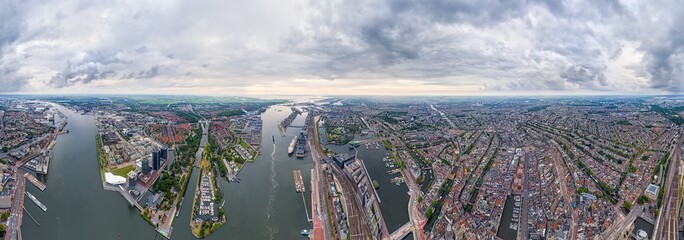 Amsterdam, Netherlands. Panorama of the city on a summer morning in cloudy weather. Panorama 360....