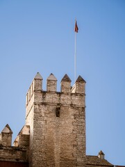 A bastion tower on the walls of the Real Alcazar in Seville - obrazy, fototapety, plakaty
