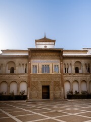 The frontal view of the Royal Palace in the Real Alcazar de Seville, from the Patio de la Monteria