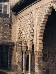 Ornamental wood and stone carvings in the interior of the Real Alcazar de Seville