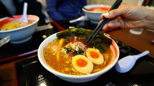 Japanese food. Japanese ramen thick creamy pork bone broth. 