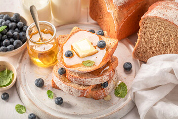 Tasty and sweet bread with fresh berries and honey.