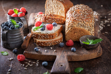 Healthy and homemade whole grain bread as an energetic breakfast.