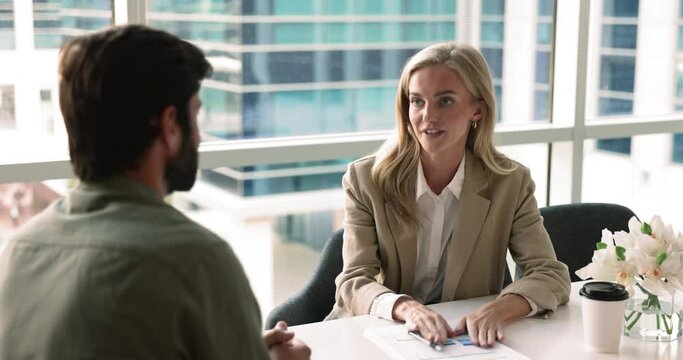 Two business partners discussing collaboration opportunity, reach agreement, find consensus on decision, making deal, conclude partnership, shaking hands finish formal meeting in office successfully