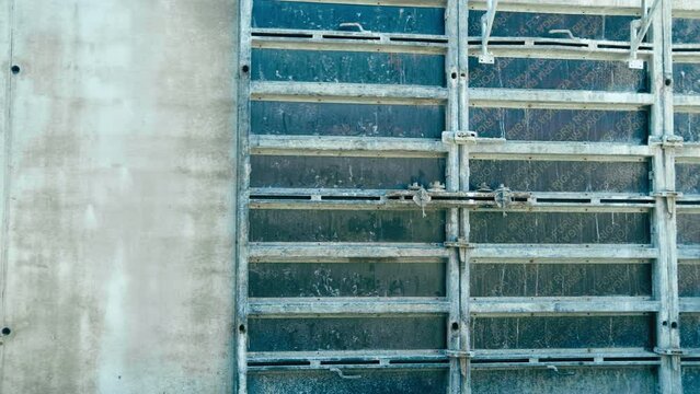 Supports of monolithic floor formwork at construction site