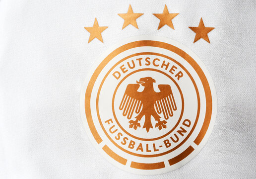 In this photo illustration, Germany national football team  logo seen displayed on a sportswear