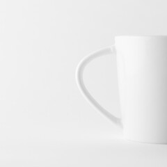 white minimalist coffee cup isolated on white background