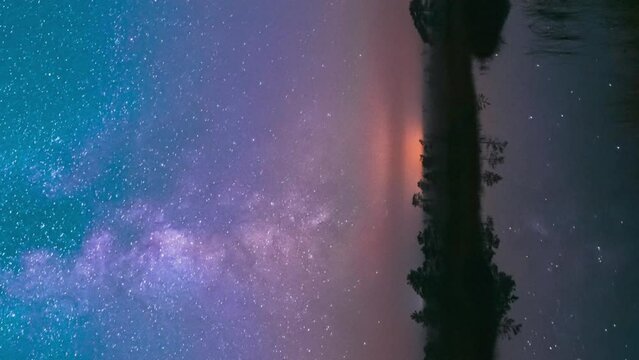 Lake Nature Landscape. Night Starry Sky Milky Way Galaxy With Glowing Stars. Time Lapse Time-Lapse Nature Hyperlapse. Night Sky Reflection In Water.