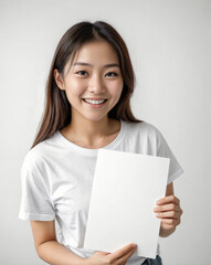 teenage woman holding a white paper